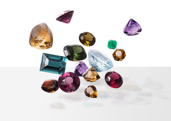 Flying perfect faceted gems with shadows. Shining luxury jewels. The third composition