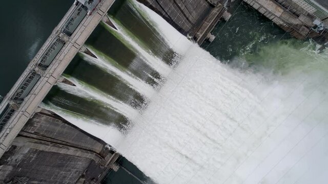 Aerial Top Down View Of Water Discharge At Hydroelectric Power Plant