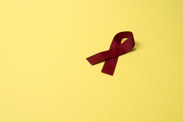 red ribbon symbol of the fight against AIDS