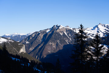 Beautiful mountain panorama at the Swiss Alps seen from mountain railway station Winteregg Mürren on a sunny winter day. Photo taken January 15th, 2022, Lauterbrunnen, Switzerland.