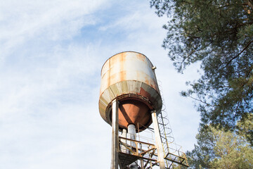 An old rusty abandoned water tower