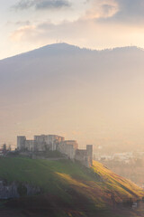 Medieval castle on a hill with Mount Vulture in background, Melfi, Basilicata