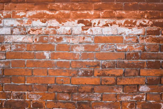 Background of dirty  red brick wall . Construction background