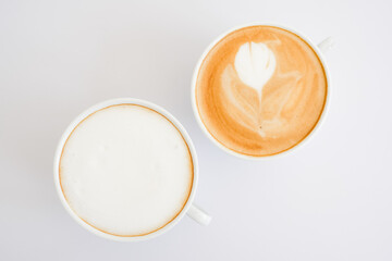Cup hot cappuccino and hot latte on white background.
