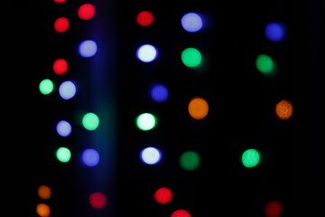 colored bokeh on a black background