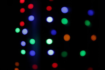 colored bokeh on a black background