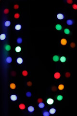 colored bokeh on a black background