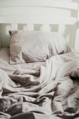 Fototapeta na wymiar linen bed linen on a light bed