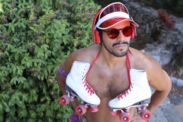 Male with cool look doing roller skating