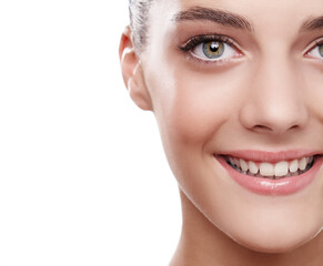 Obraz premium Healthy happy smile. Closeup studio portrait of a beautiful young woman isolated on white.