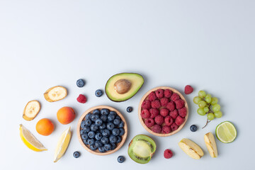 Fresh fruits and vegetables on grey background. Healthy eating concept. Flat lay, copy space.