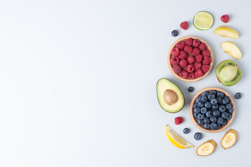 Fresh fruits and vegetables on grey background. Healthy eating concept. Flat lay, copy space.