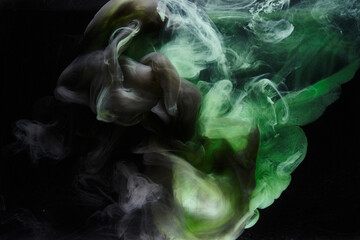 Green smoke on black ink background, colorful fog, abstract swirling emerald ocean sea, acrylic...