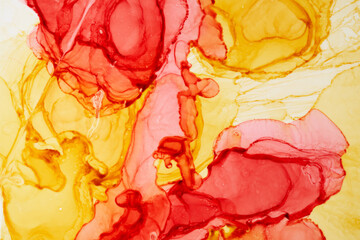 Abstract red yellow watercolor background. Paint stains and wavy spots in water, luxury fluid liquid art orange wallpaper