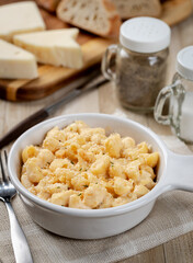 Macaroni and cheese in a white baking dish