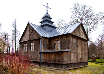 Built in 1884, a historic wooden Roman Catholic chapel with a spring in the village of Hodyszewo in Podlasie, Poland.