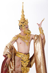 Half body portrait of 20s asian man wear gold leaf foil and golden dress of National costume