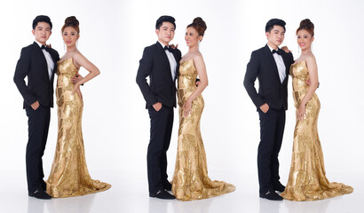 Two couple Full length of man in black suit tie and woman in gold long ball evening gown for gala