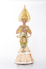 Full length portrait of 20s asian woman wear gold leaf foil and golden dress of National costume