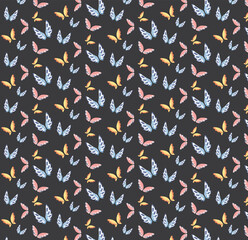 Vector image with a pattern of multicolored butterflies on a black background