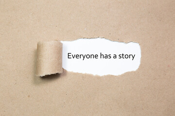 Everyone has a story word written under torn paper