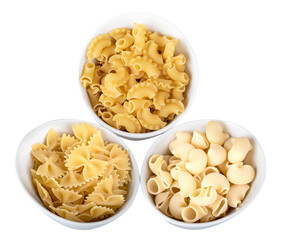 Pasta in a white bowl, isolated on a white background. Top view