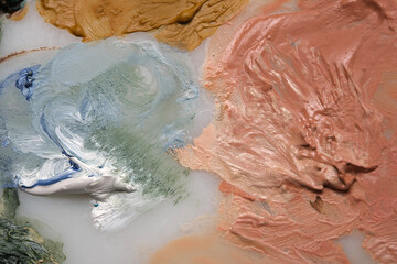 Vibrant multi-coloured artists traditional oil paint palette