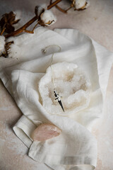Divination pendulum on a quartz geod