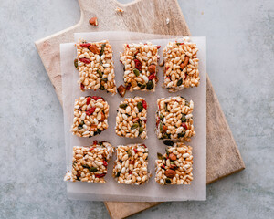Puffed rice snack bars with goji berries, pumpkin seeds and almonds