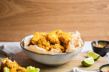 vegan chicken nuggets on a table with sides