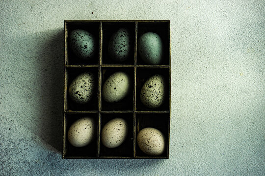 Assorted Easter eggs in a wooden box