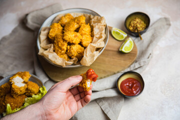 vegan chicken nuggets on a table with sides