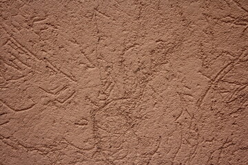 Old scratched brown painted weathered texture of concrete stone wall background
