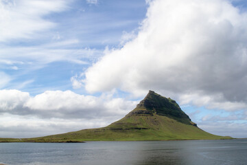 Icelandic mountain on a sunny day by the water
