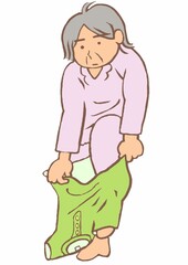 認知症　着衣失行　Tシャツをズボンのように履こうとする高齢女性