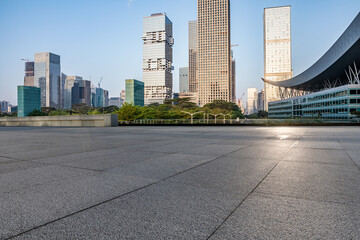 Empty square floor and city skyline with modern commercial office buildings in Shenzhen, China. © ABCDstock