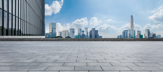 Panoramic skyline and modern commercial office buildings with empty road at Shenzhen, China. empty...