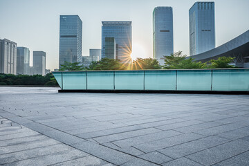 Empty square floor and city skyline with modern commercial office buildings in Shenzhen, China.