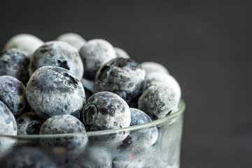 frozen ripe blueberries closeup background