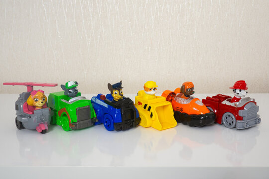 Minsk, Belarus - September 1, 2020: Paw patrol team in cars standing in a row. miniatures of heroes of the animated series. special equipment and cars