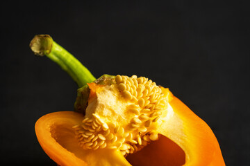 fresh open pepper seeds closeup colorful pattern background