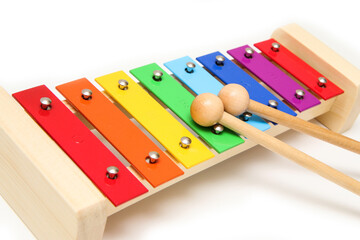 The basic xylophone for children to learn to play simple music. Isolated in a white background. 