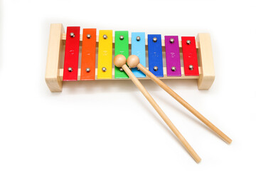 The basic xylophone for children to learn to play simple music. Isolated in a white background. 