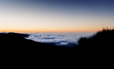 Relaxing sea of clouds at sunset in the hills near Mount Teide