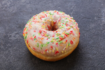 Sweet glazed vanilla donut with icing