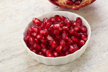 Ripe red Pomegranate seeds in the bowl