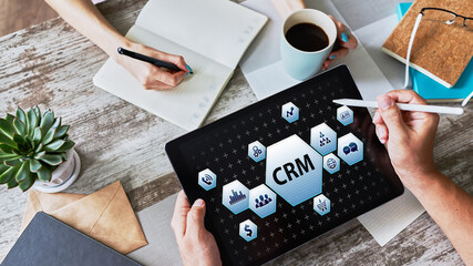 CRM - customer relationship management system concept on screen.