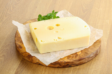 Maasdam cheese over the board
