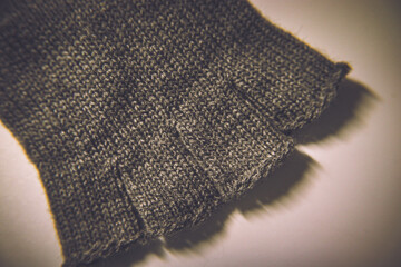 Close-up fingerless gloves, selective focus.