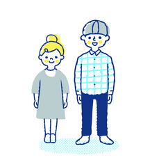 笑顔で立っている女の子と男の子